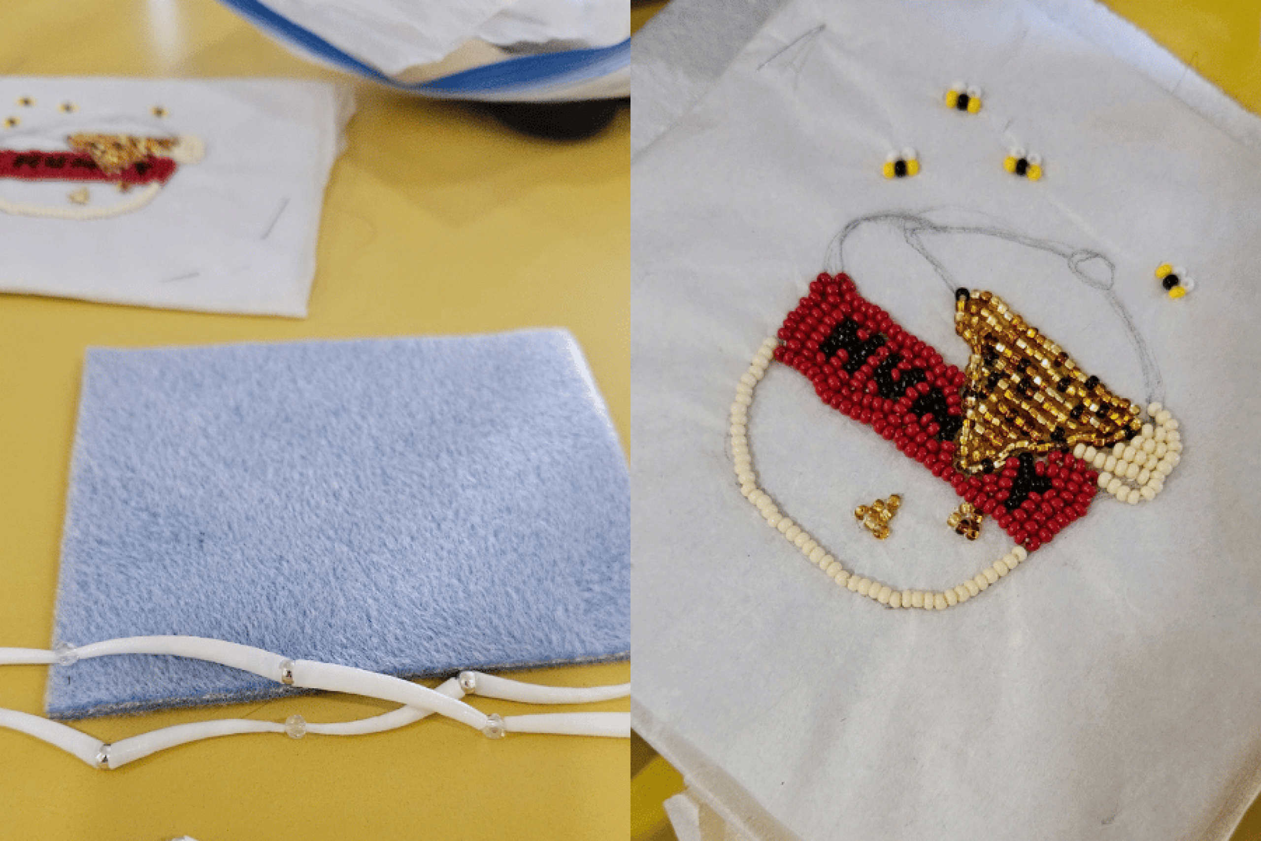 A beaded honey jar with several small bees in progress on white felt, beside blue felt and strands of white beads.