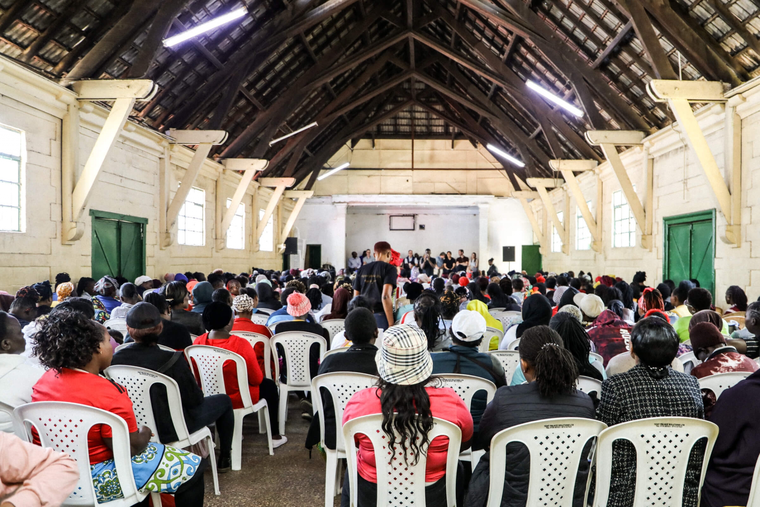 A community centre full of people