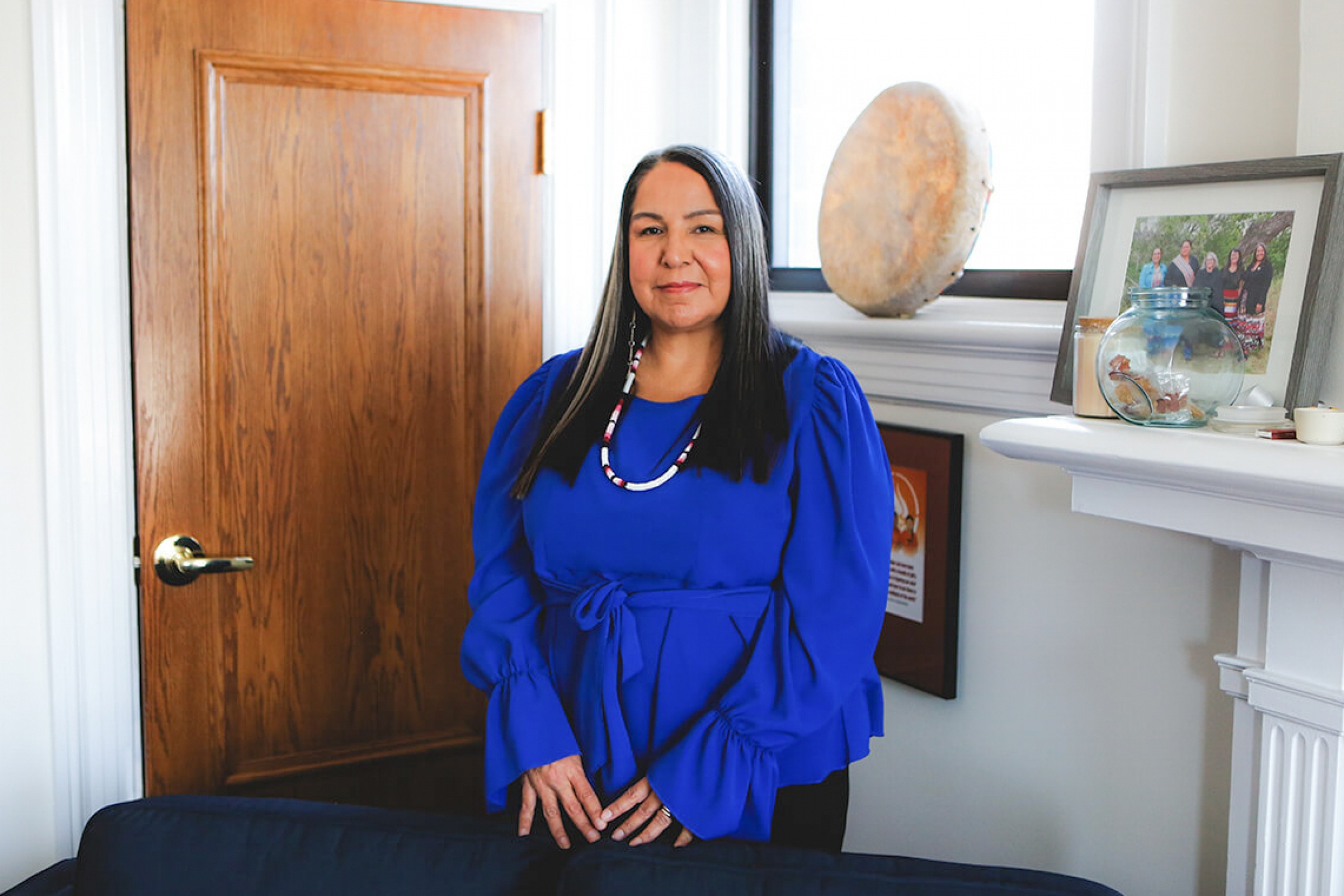 Stephanie Scott, executive director of the National Centre for Truth and Reconciliation stands in Chancellor's Hall, looking at the camera