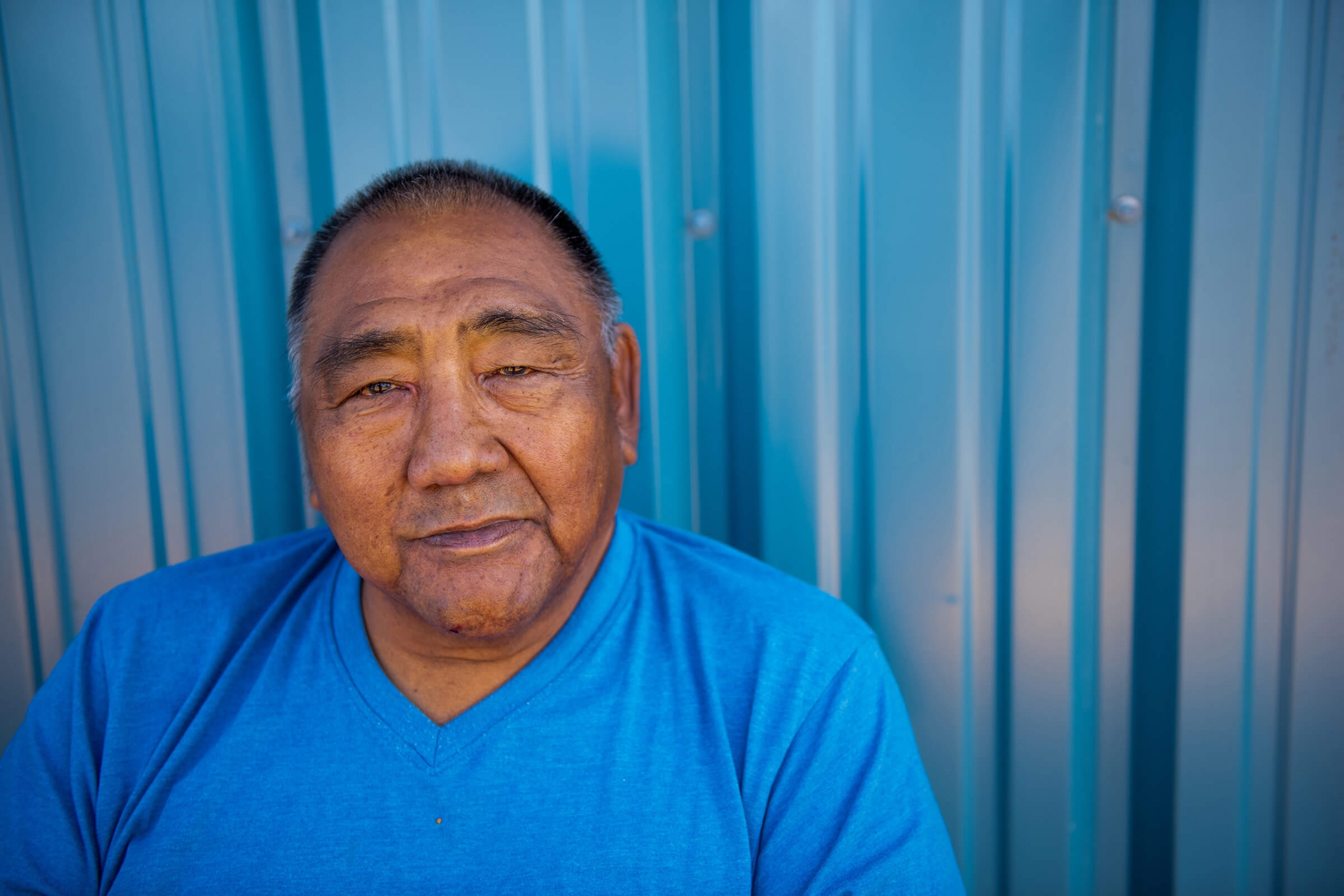 A peaceful man in a blue t-shirt