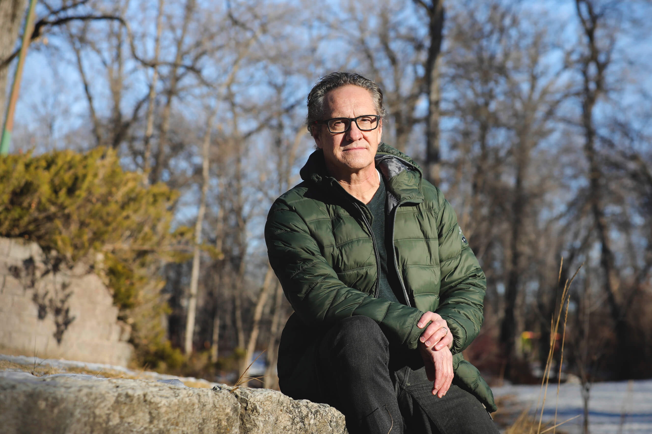 A man sitting on a rock