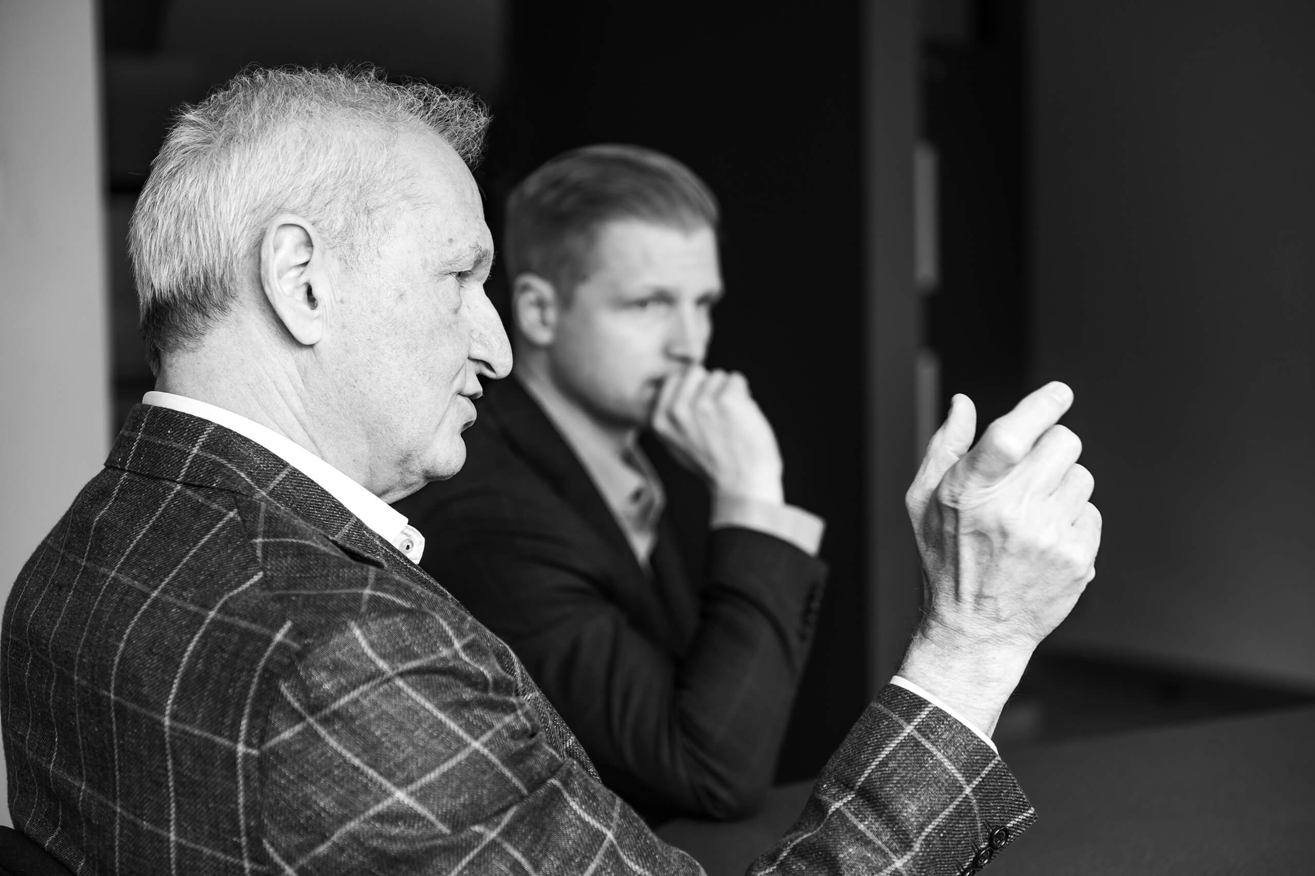 two men in conversation