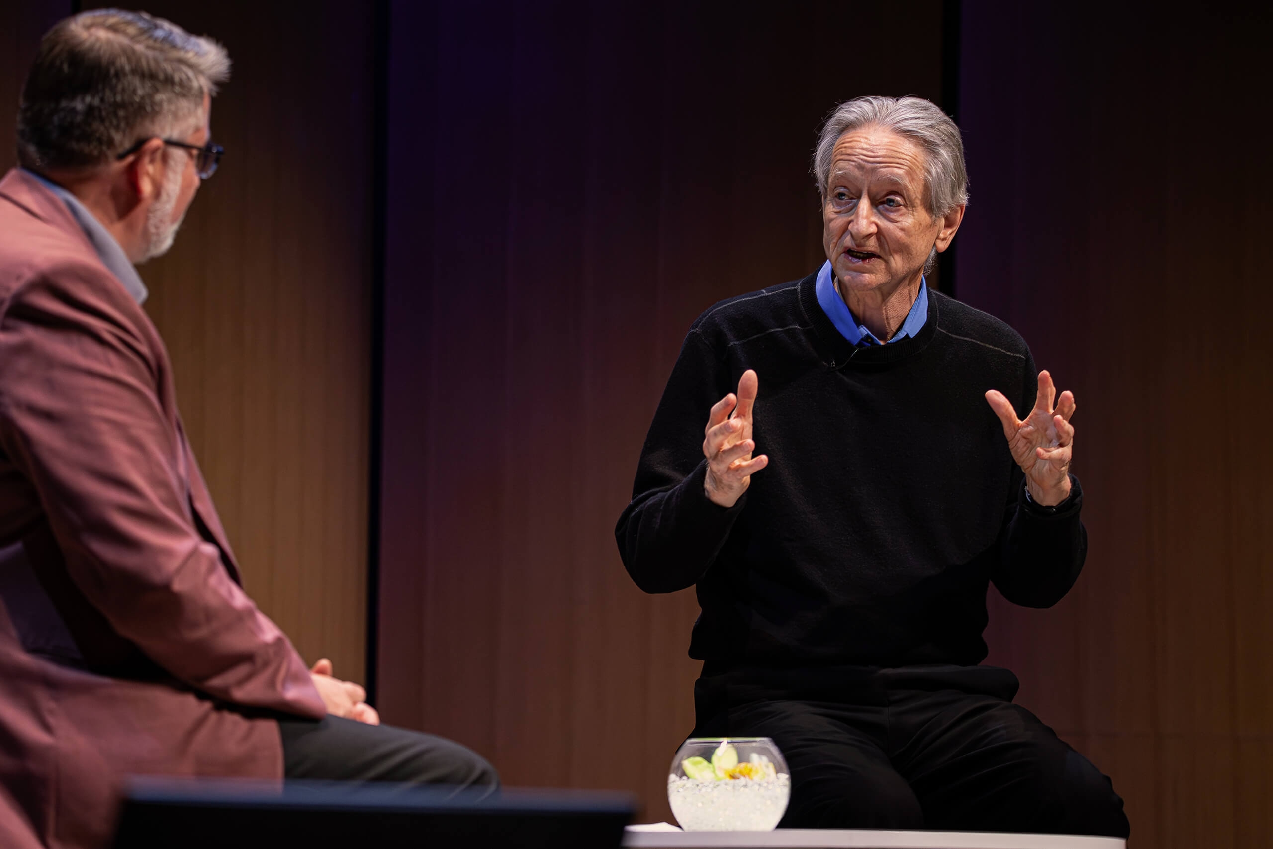 A man speaking on stage
