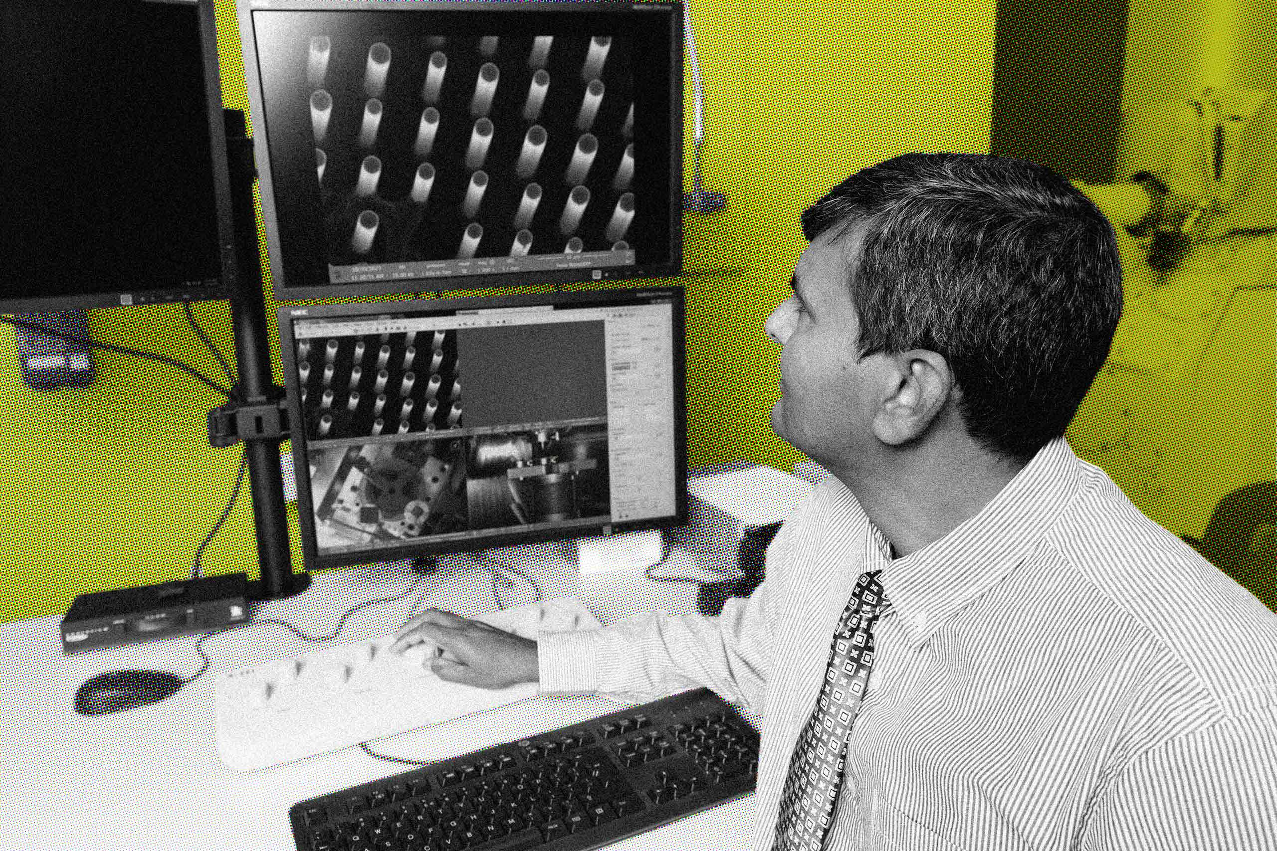 A man looking at a screen